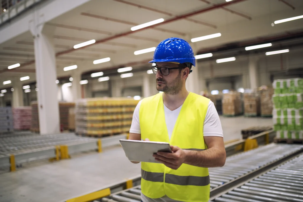 RTLS vs. RFID: Which Asset Tracking Technology Is Right for Your Operation? 5 Worker checking RTLS Software in a tablet.