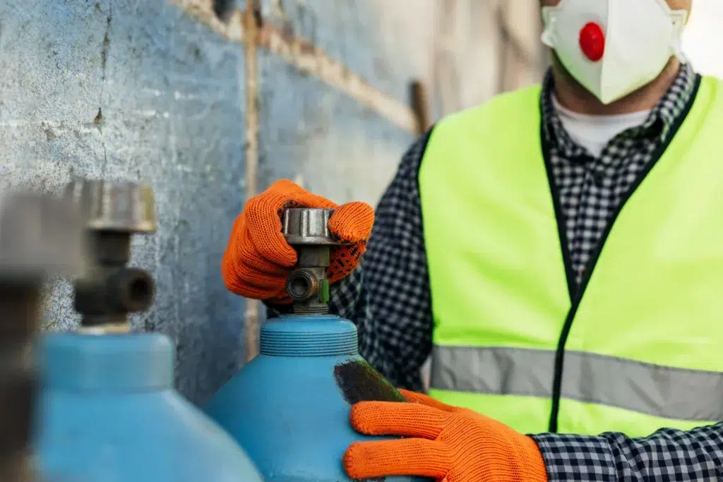 From Gas Detectors to Serialized Equipment: Asset Tracking Use Cases for Hazardous Industrial Environments 2 Serialized asset tracking in hazardous areas — worker managing gas cylinder requiring chain-of-custody documentation and zone compliance monitoring